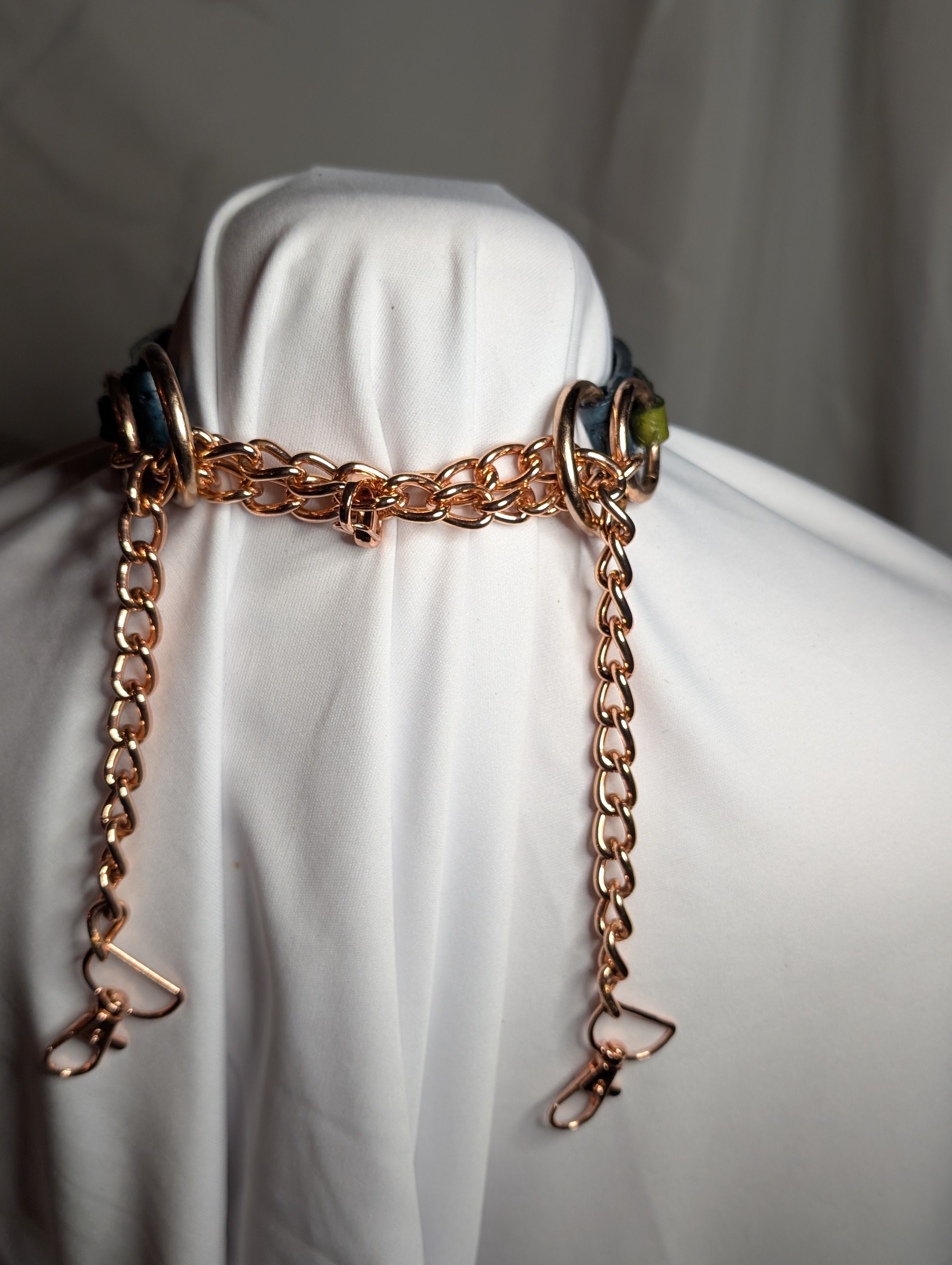 Straight cut collar with choker chain and riveted ring strap; blue and green
