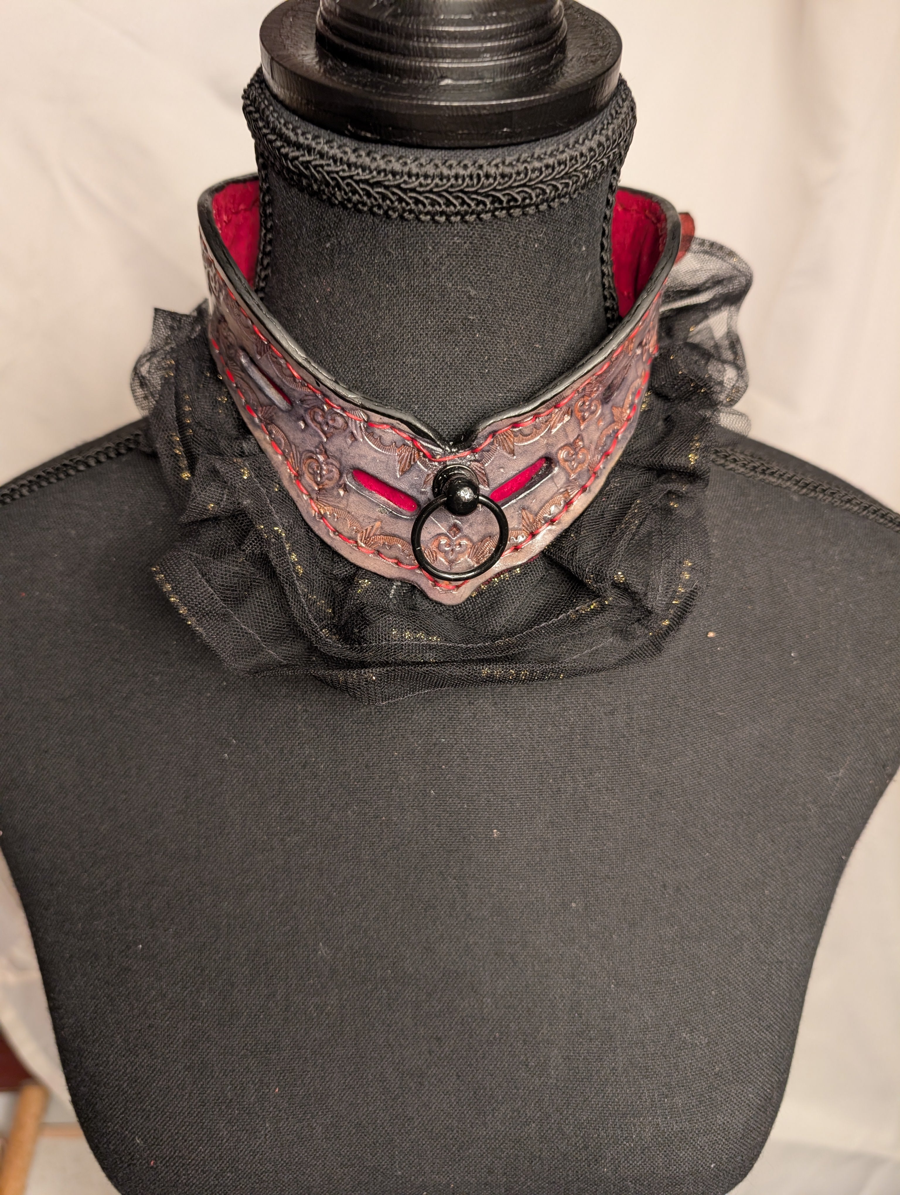 Leather collar, cut out with lace trim. Violet with red suede lining