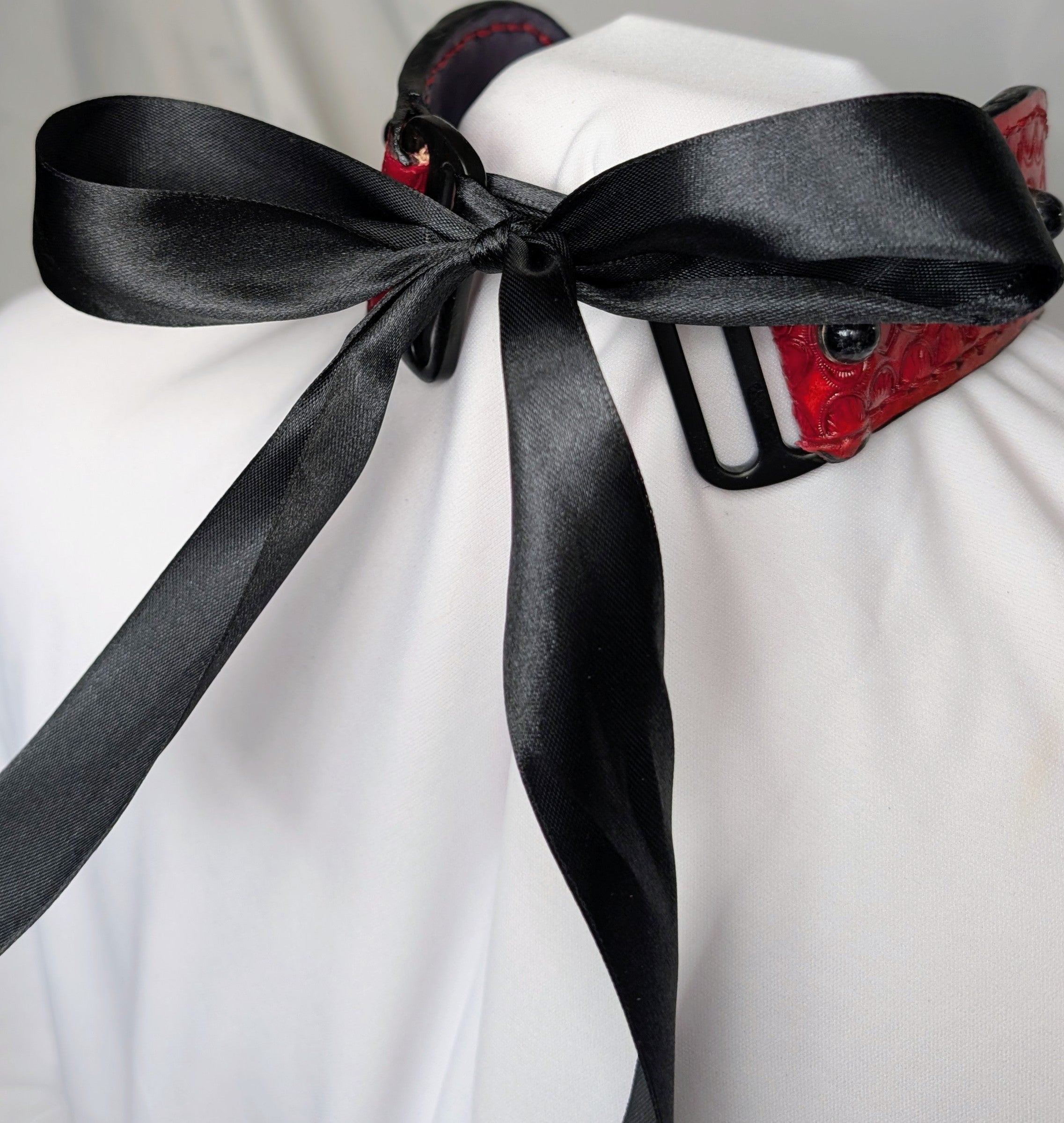 Red leather with Black stone, bow tie and black hardware