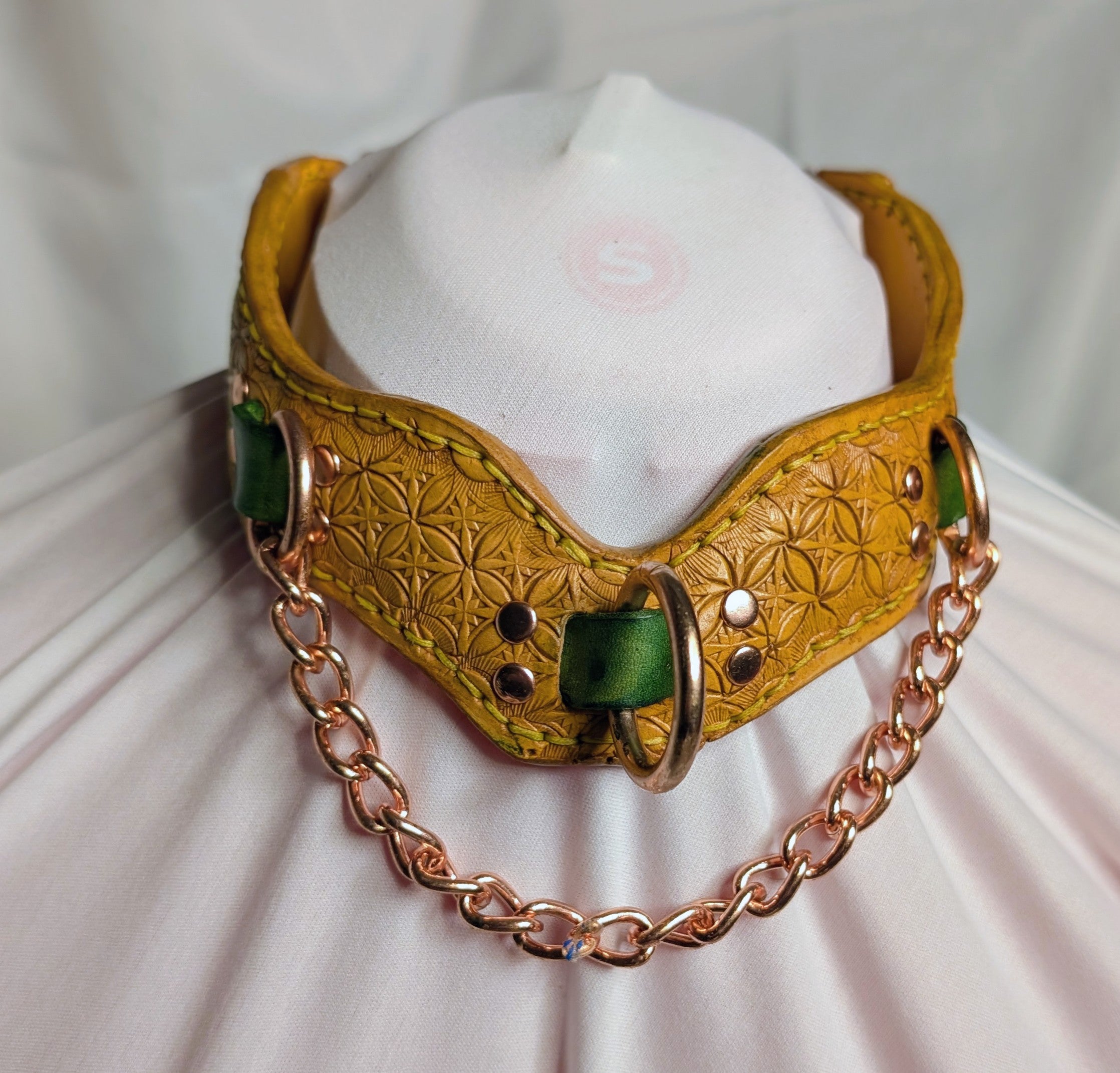 Leather, buckled working collar w/ chain. Yellow with green accent