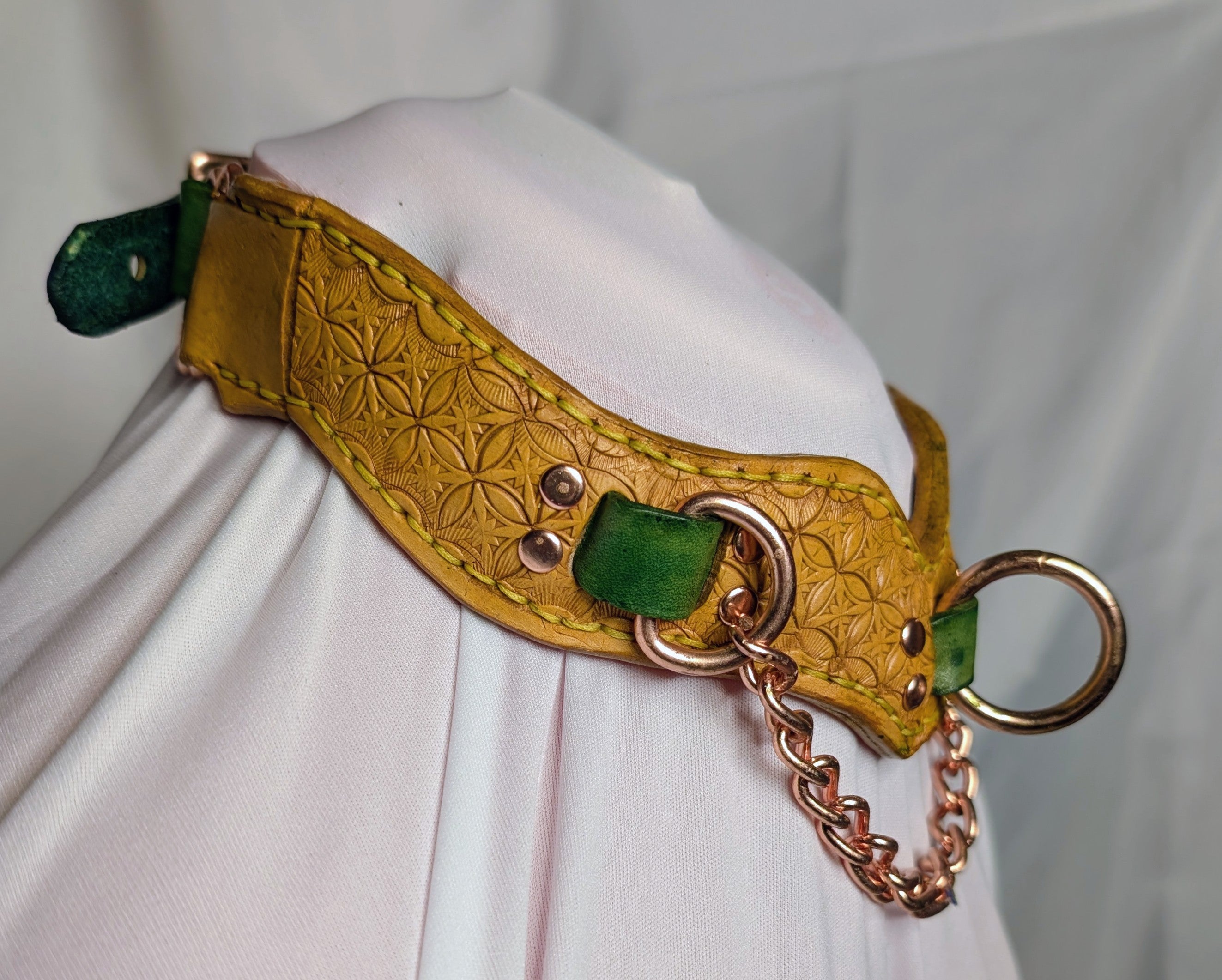 Leather, buckled working collar w/ chain. Yellow with green accent