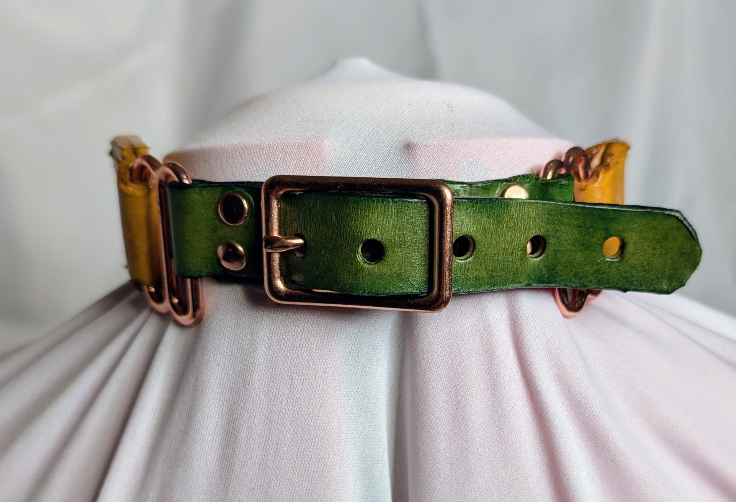 Leather, buckled working collar w/ chain. Yellow with green accent