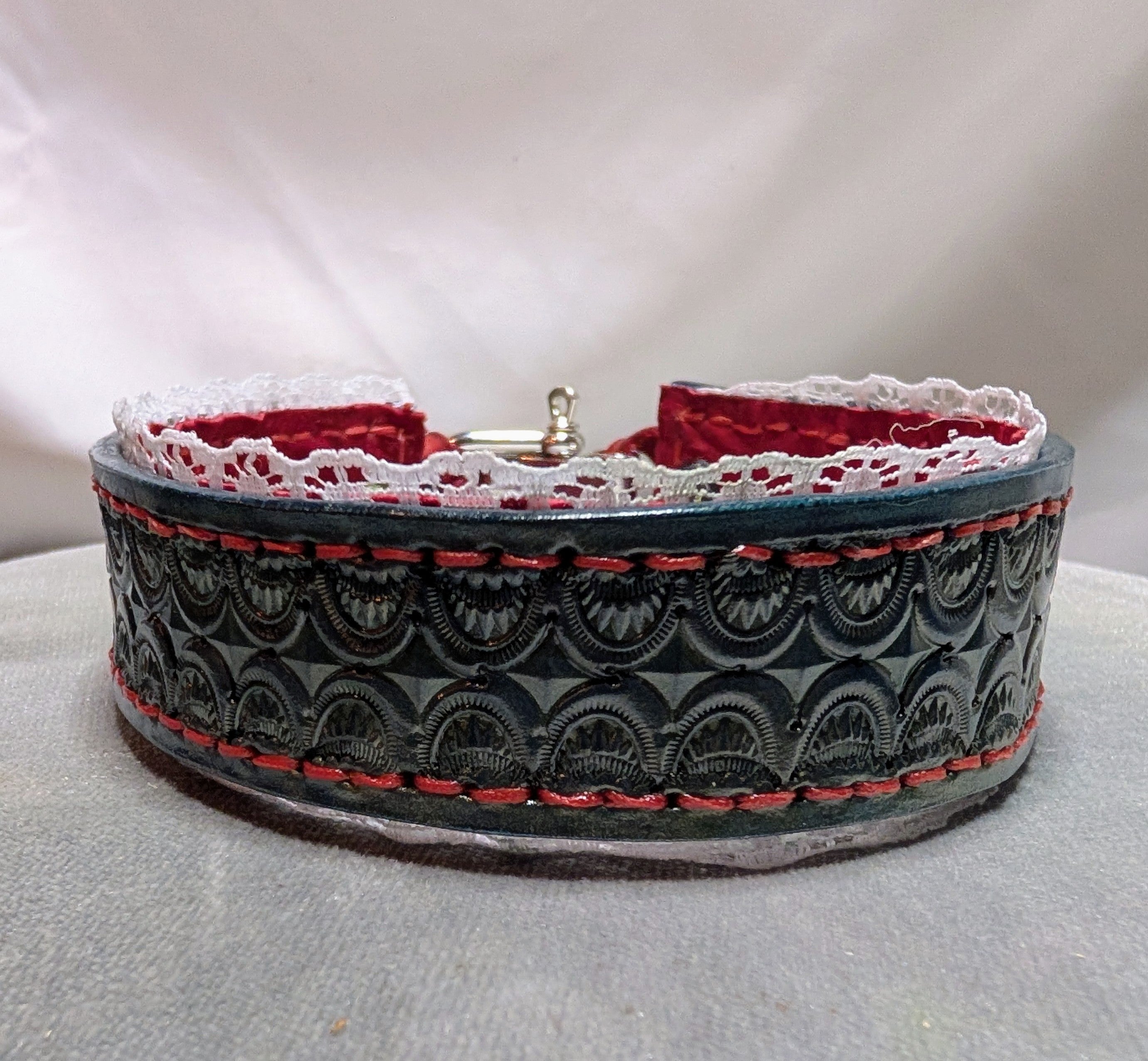 Blue leather day collar with red suede lining and lace trim