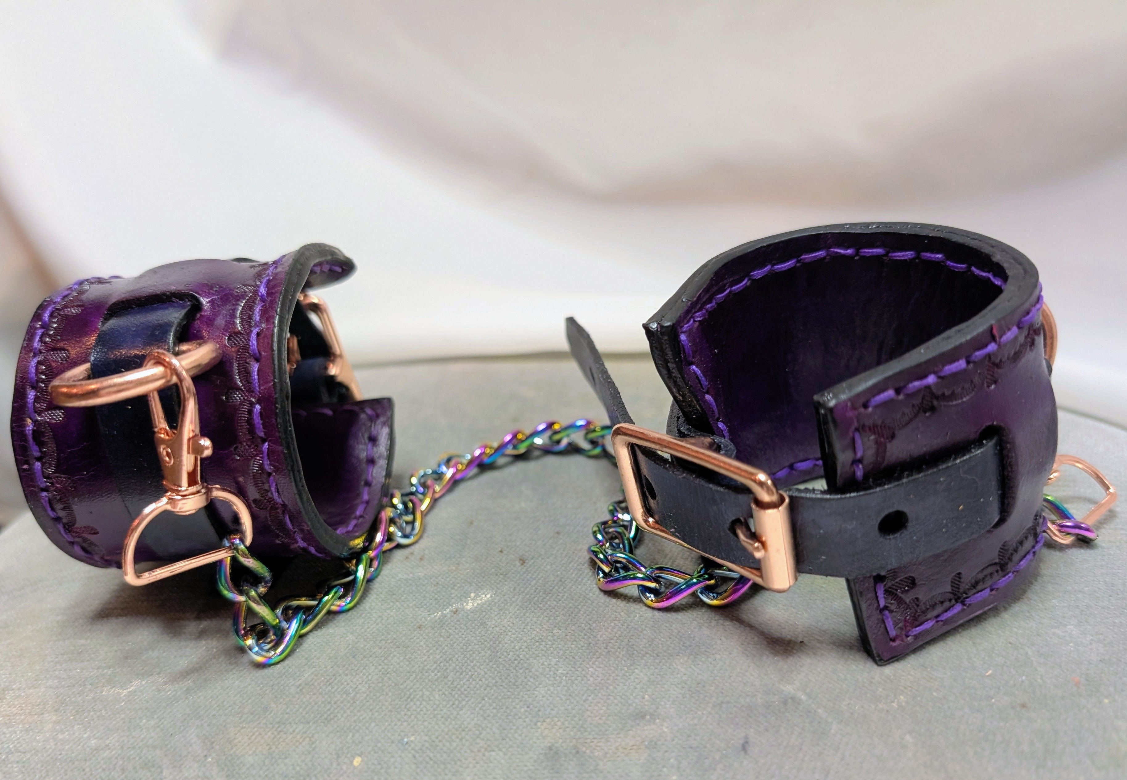leather buckled double strap wrist cuffs