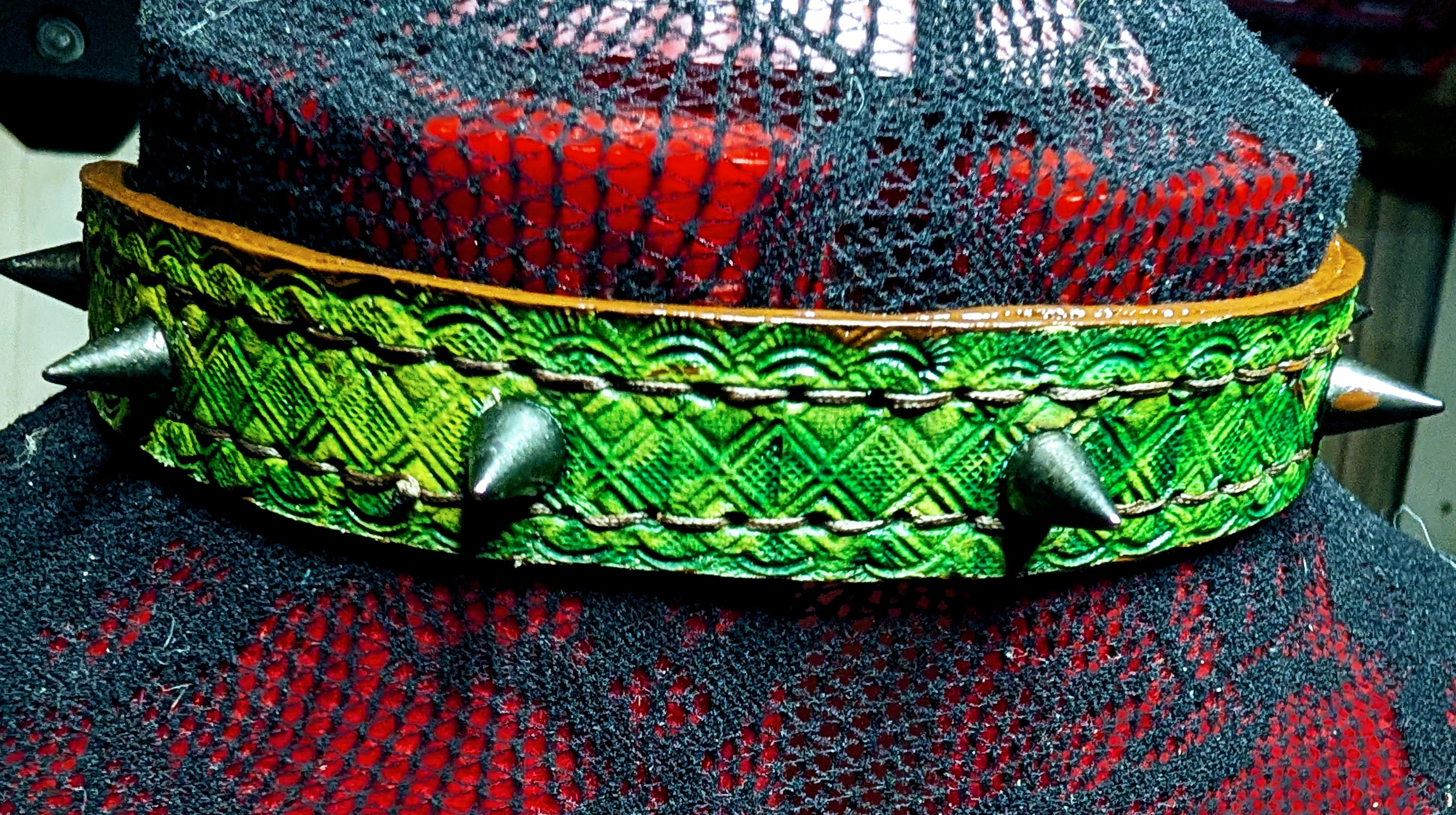 Slim buckled leather collar with spikes. Green with brown